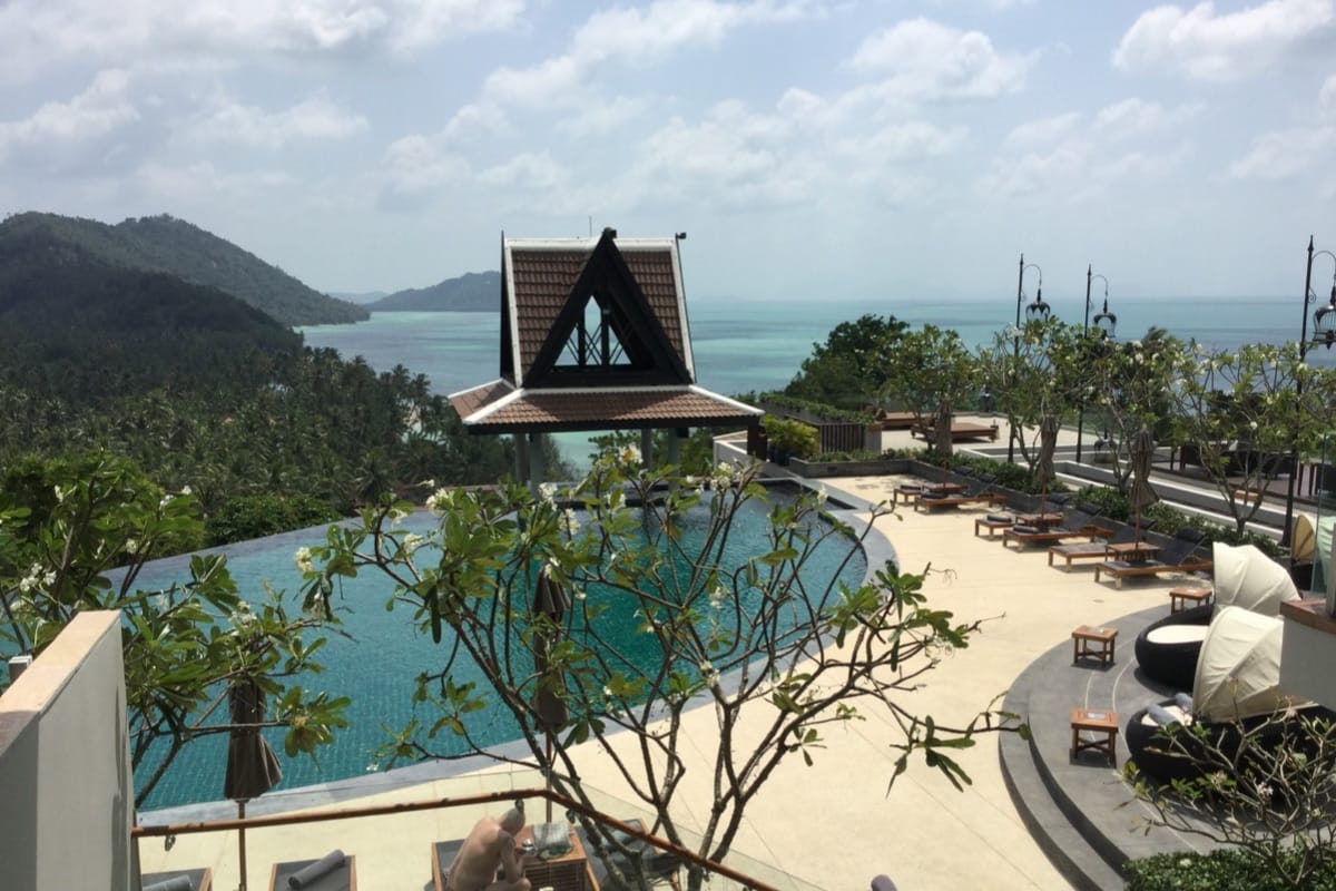 Infinity pool at InterContinental Koh Samui Resort overlooking the Gulf of Thailand at sunset